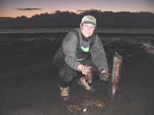 Proud clam digger displaying her catch